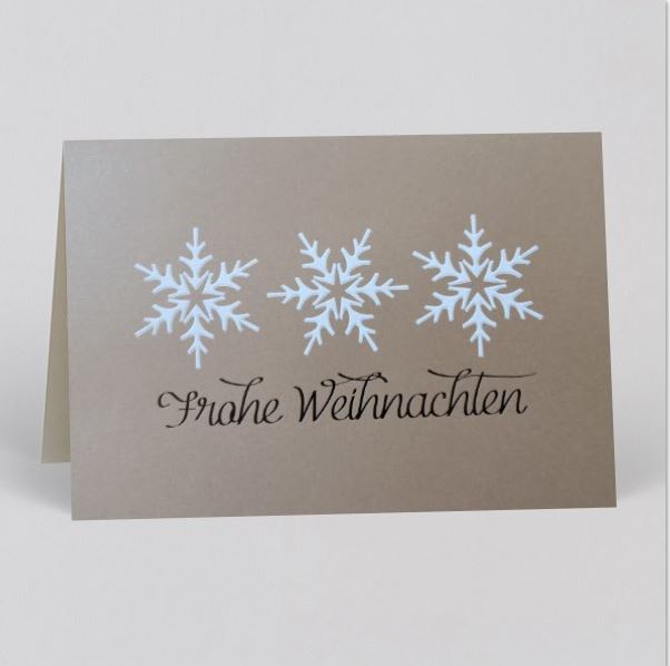 Braune Weihnachtskarte mit Einlegeblatt, Eiskristallen und Gruß "Frohe Weihnachten"