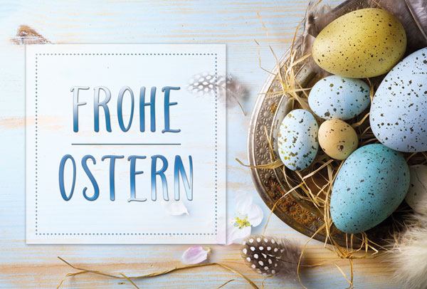 Ostergrußkarte mit Blaufolienprägung und einem Nest mit bunten Eiern