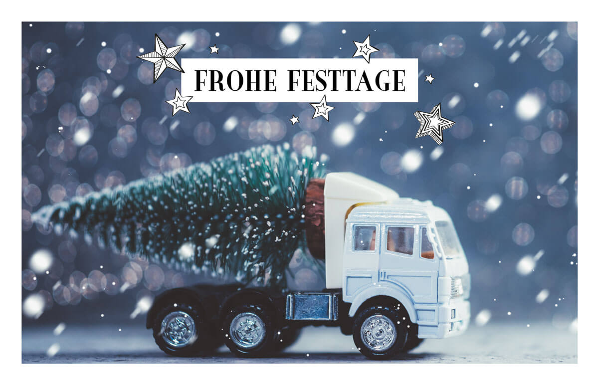 Humorvolle Weihnachtskarte mit Weihnachtsbaum auf weißem LKW und Weihnachtsgruß