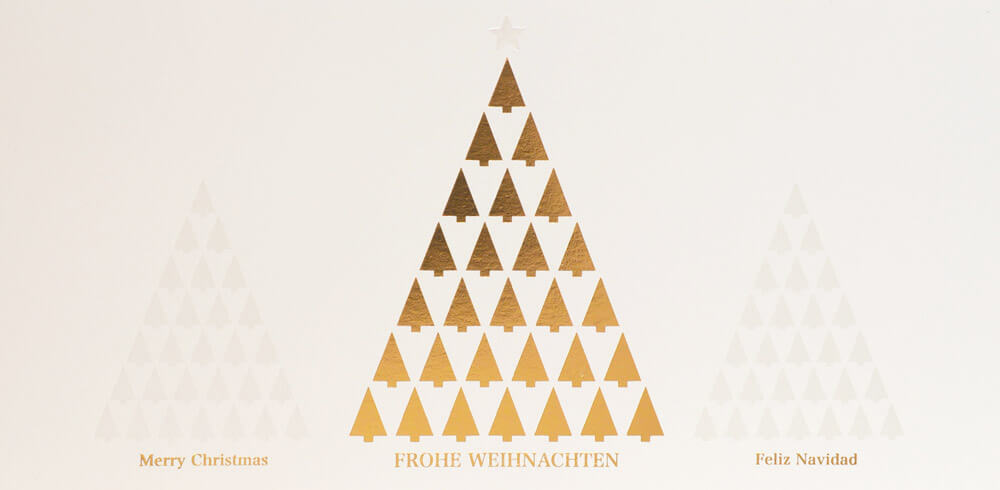 Internationale Weihnachtskarte in creme mit Gold- und Perlmuttprägung, DIN lang