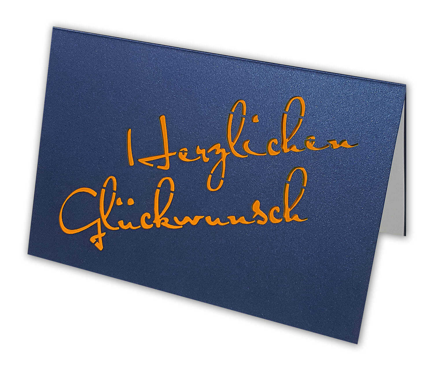 Dunkelblaue Glückwunschkarte mit Ausstanzung "Herzlichen Glückwunsch" und Einlegeblatt in orange / weiß