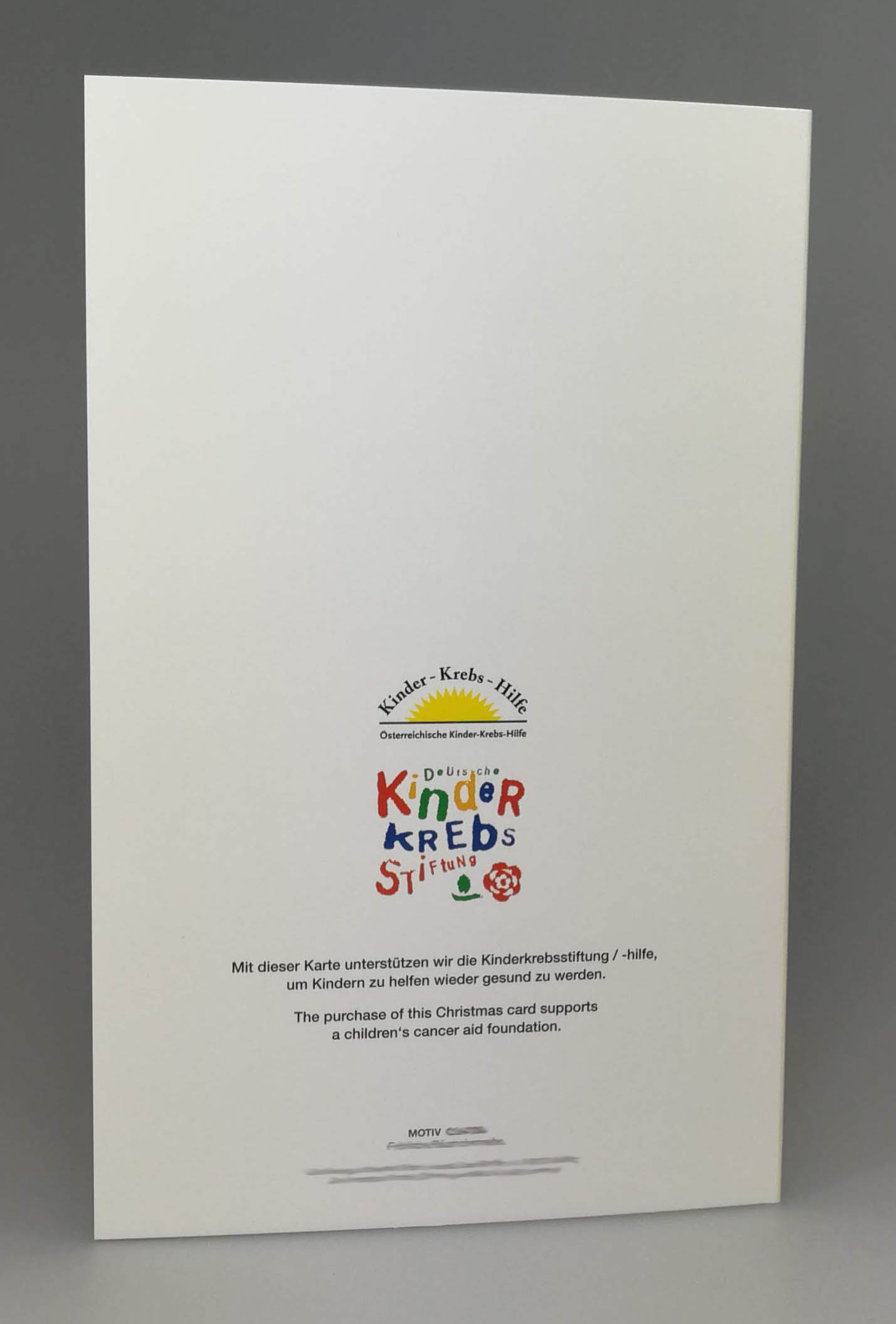 Rückseite der Spendenkarte mit Aufdruck Deutsche Kinderkrebs-Stiftung und Öster. Kinder-Krebs-Hilfe