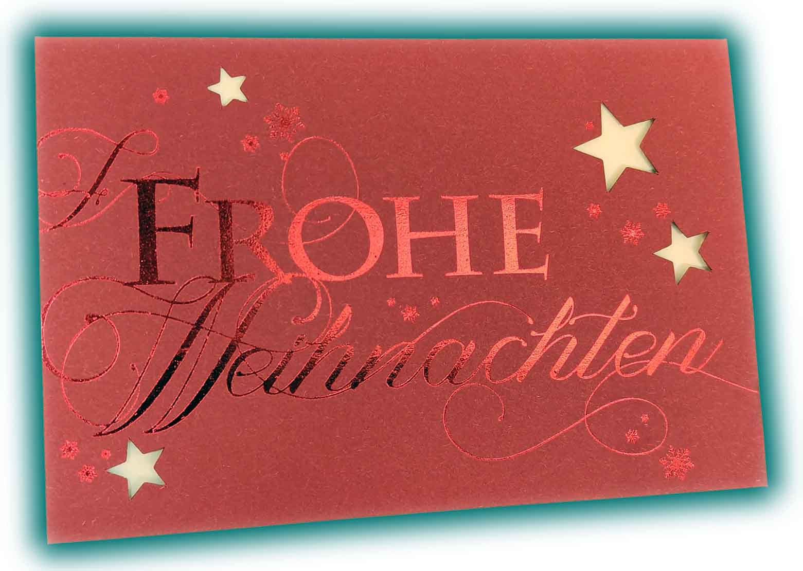 Spenden-Weihnachtskarte in rot mit Sternstanzung und Spende für Peter Maffay Stiftung