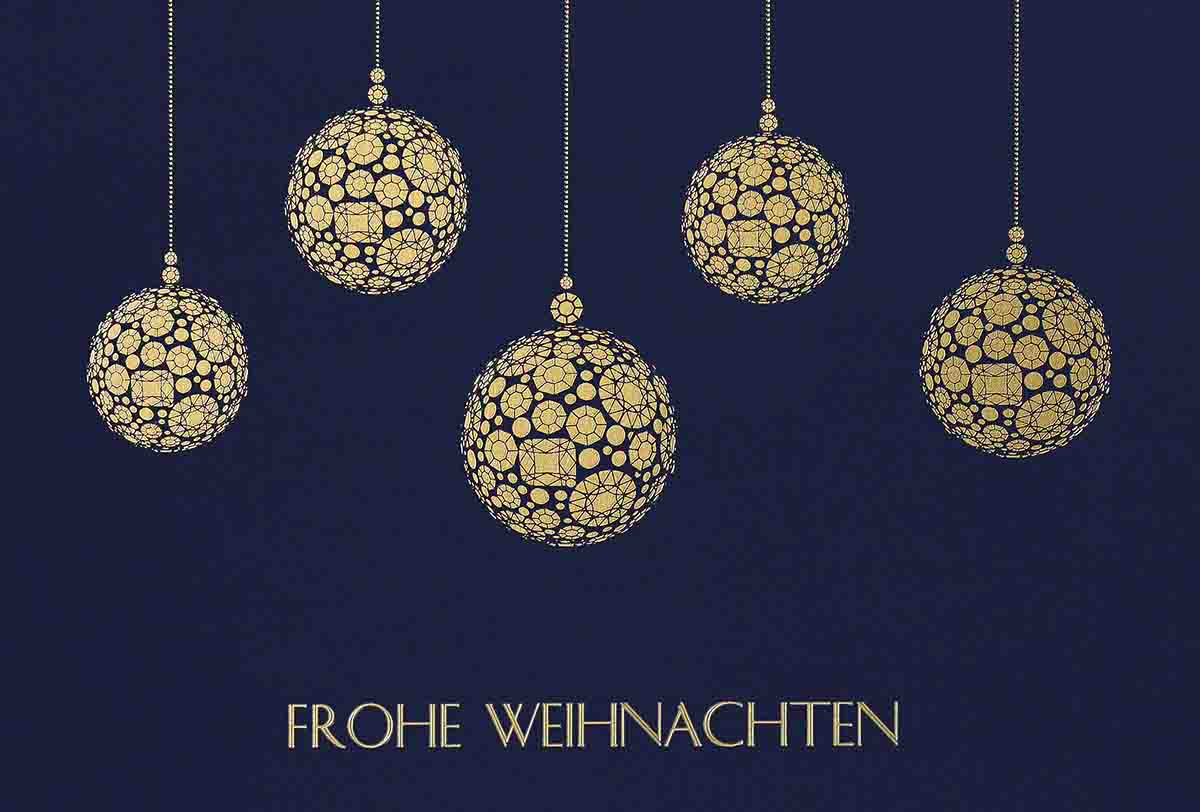 Exclusive Weihnachtskarte in blau mit goldenen Kugeln und "Frohe Weihnachten" als Gruß