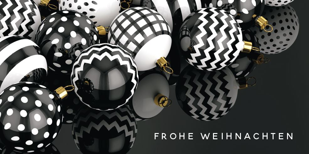 Weihnachtskarte in schwarz-weiß mit modernen Christbaumkugeln und "Frohe Weihnachten"