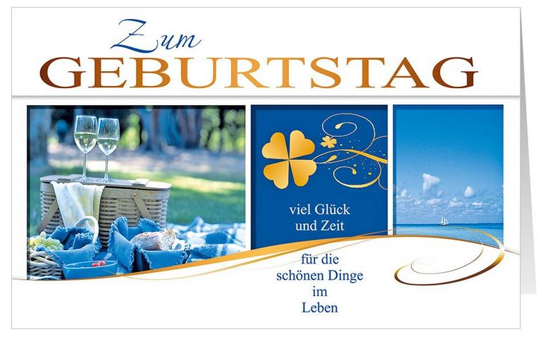 Glückwunschkarte zum Geburtstag mit Picknickkorb im Grünen, Kleeblatt und Wasser unter blauem Himmel