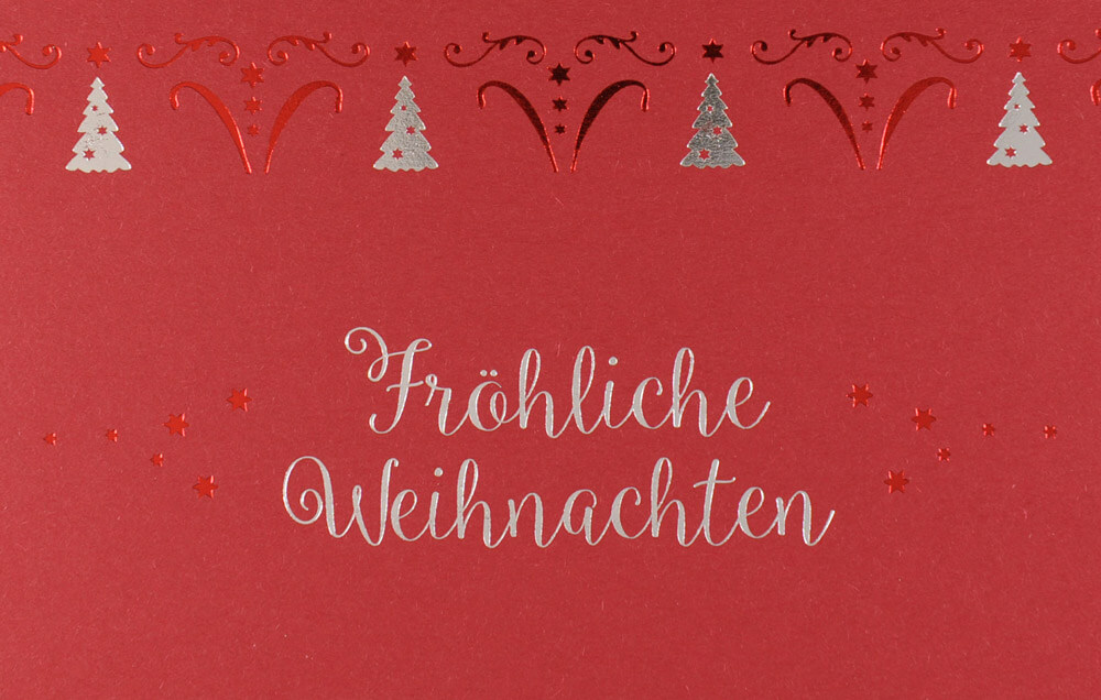 Rote Weihnachtskarte mit edler Silber- und Rotfolienprägung von Tannenbäumen und Gruß