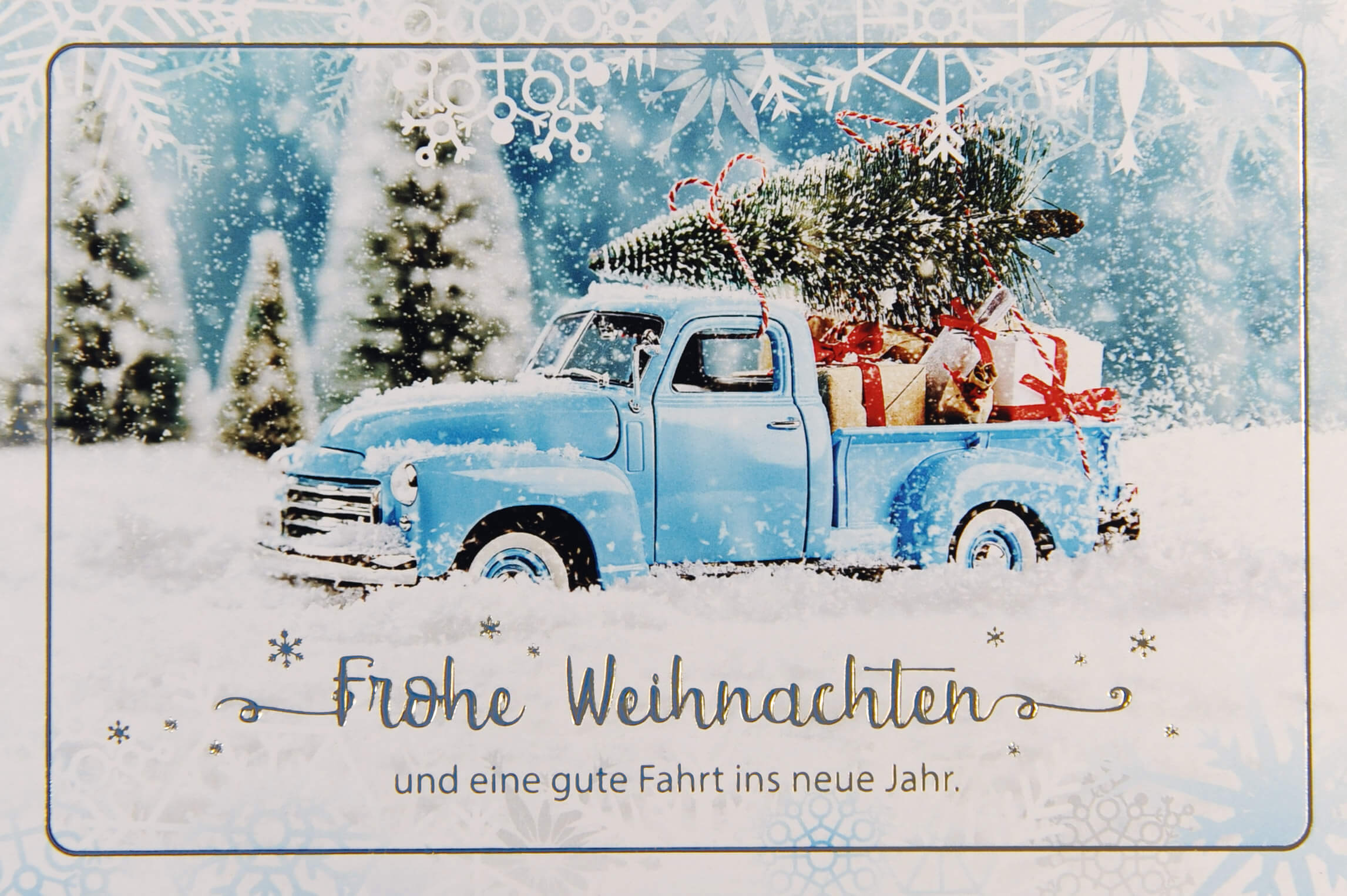 Weihnachtskarte mit blauem Transporter und Gruß: eine gute Fahrt ins neue Jahr.