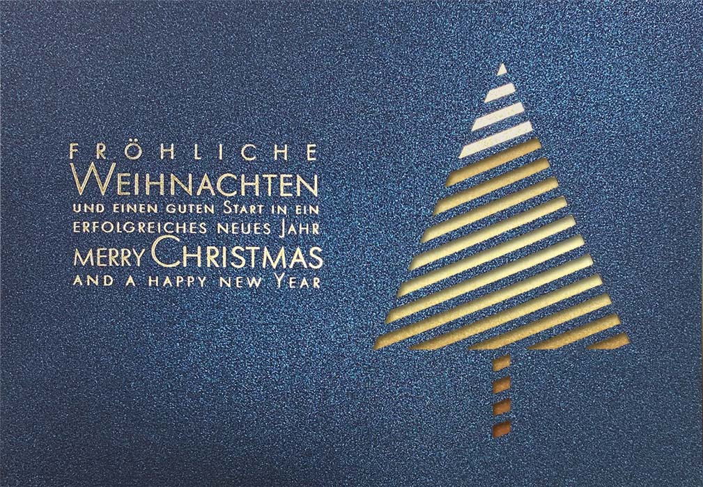 Weihnachtliche Spendenkarte in blau mit goldenem Falteinleger und Spende zugunsten DKKS