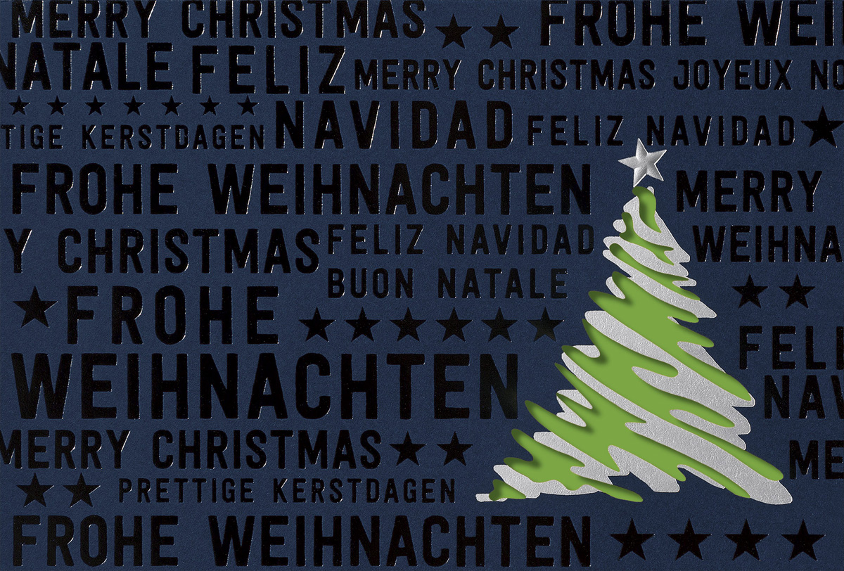 Internationale Weihnachtskarte in nachtblau mit grünem Einlegeblatt und Baumstanzung