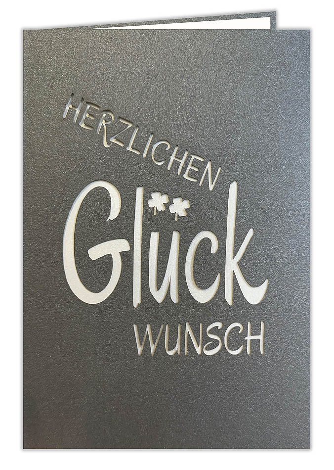 Anthrazitgraue Glückwunschkarte im Hochformat, mit Ausstanzung "Herzlichen Glückwunsch" und Einlegeblatt 