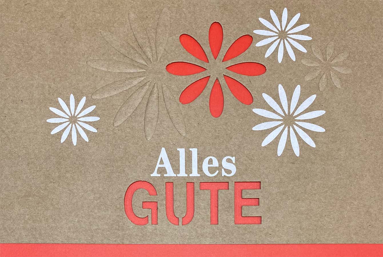 Naturbraune Glückwunschkarte mit Blüten und  "Alles Gute" sowie rotem Einlegeblatt