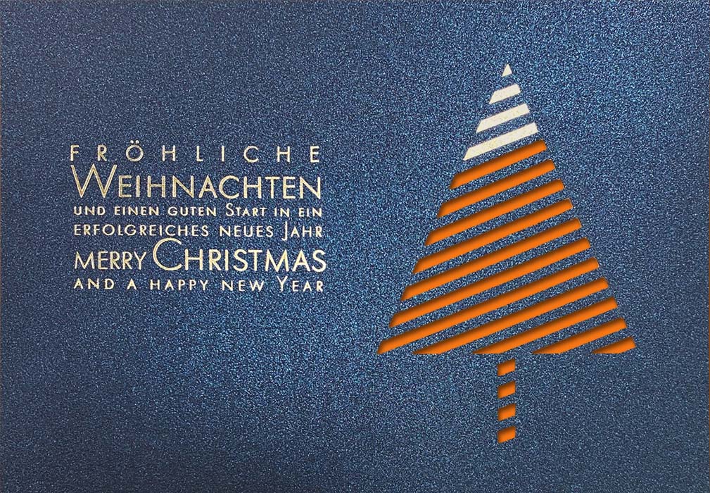 Blaue Weihnachtskarte mit Folienprägung in gold und Stanzung, Einlegeblatt orange