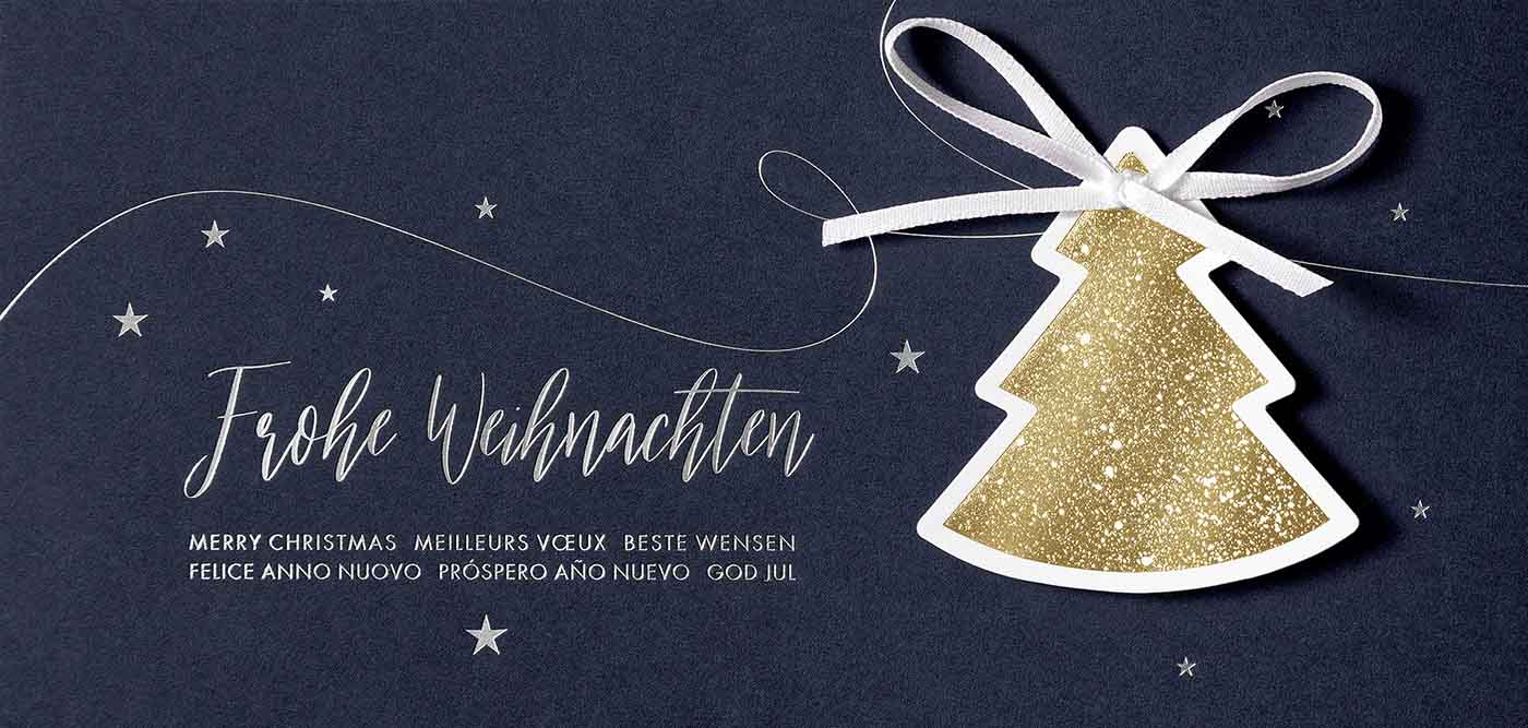 Weihnachtskarte im DIN lang Format in blau mit Baumanhänger in gold und weißer Schleife