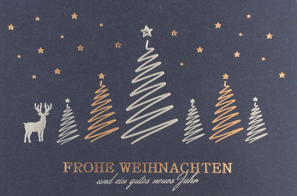 Festliche Weihnachtskarte in blau mit Weihnachtsgruß und weihnachtlichem Motiv