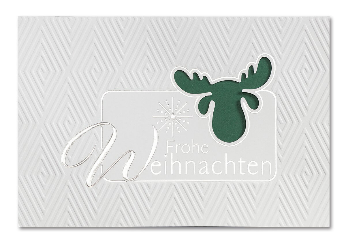 Weiße Weihnachtskarte mit Rentier und dunkelgrünem Einleger