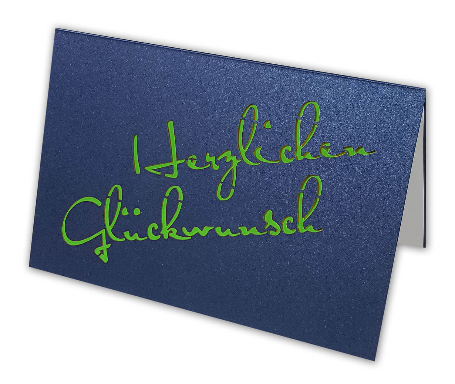 Dunkelblaue Glückwunschkarte mit Ausstanzung "Herzlichen Glückwunsch" und Einlegeblatt in grün / weiß