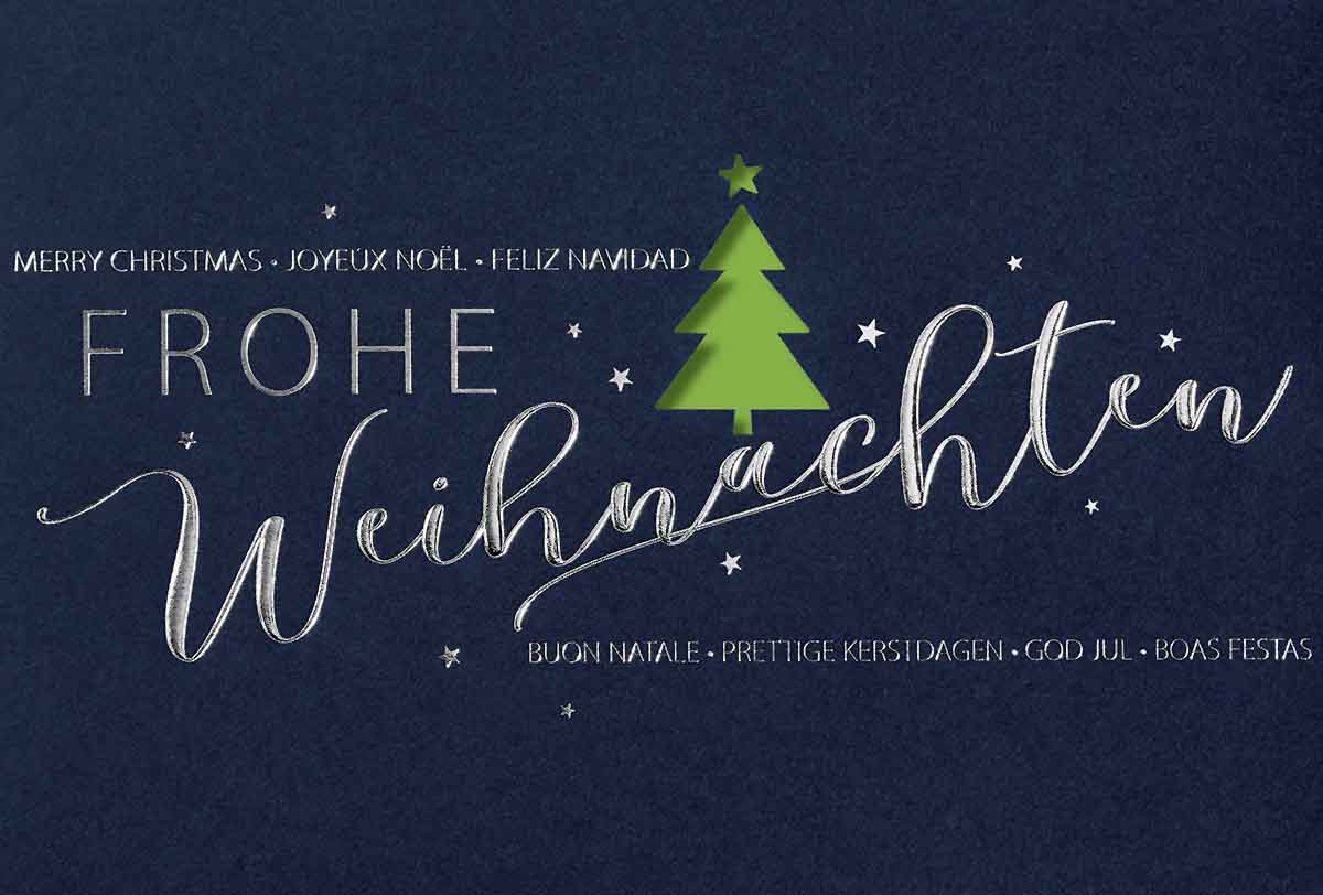 Dunkelblaue Weihnachtskarte mit Silberprägung und Formstanzung Baum, inkl. Einleger hellgrün