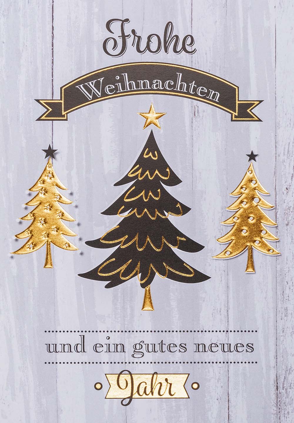 Weihnachtskarte mit Tannenbäumen und Weihnachts- sowie Neujahrsgruß in gold und schwarz