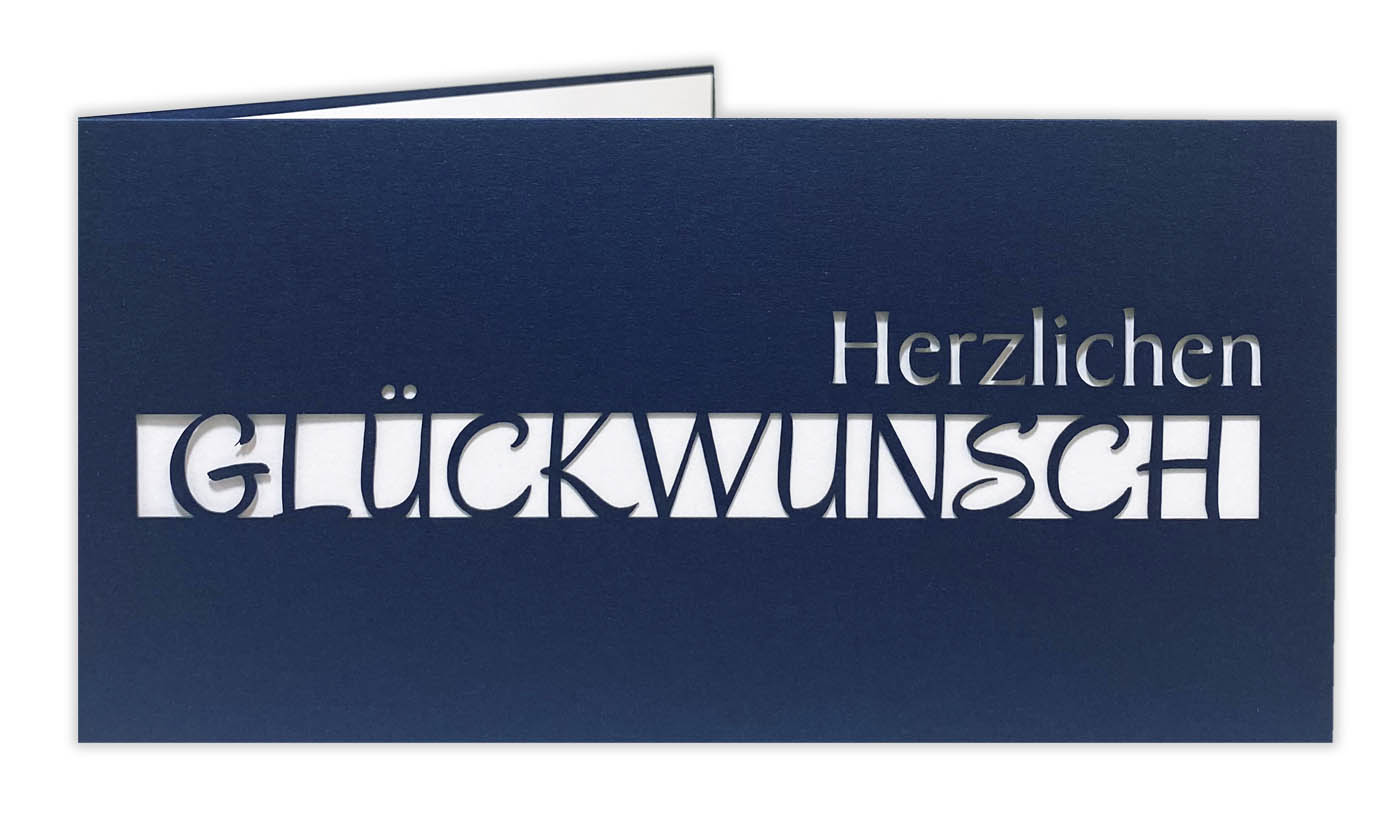 Dunkelblaue Glückwunschkarte mit Ausstanzung "Herzlichen Glückwunsch" und weißem Einlegeblatt