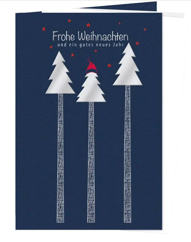 Dunkelblaue Weihnachtskarte im humorvollen Design mit Silberbäumchen und roten Sternen