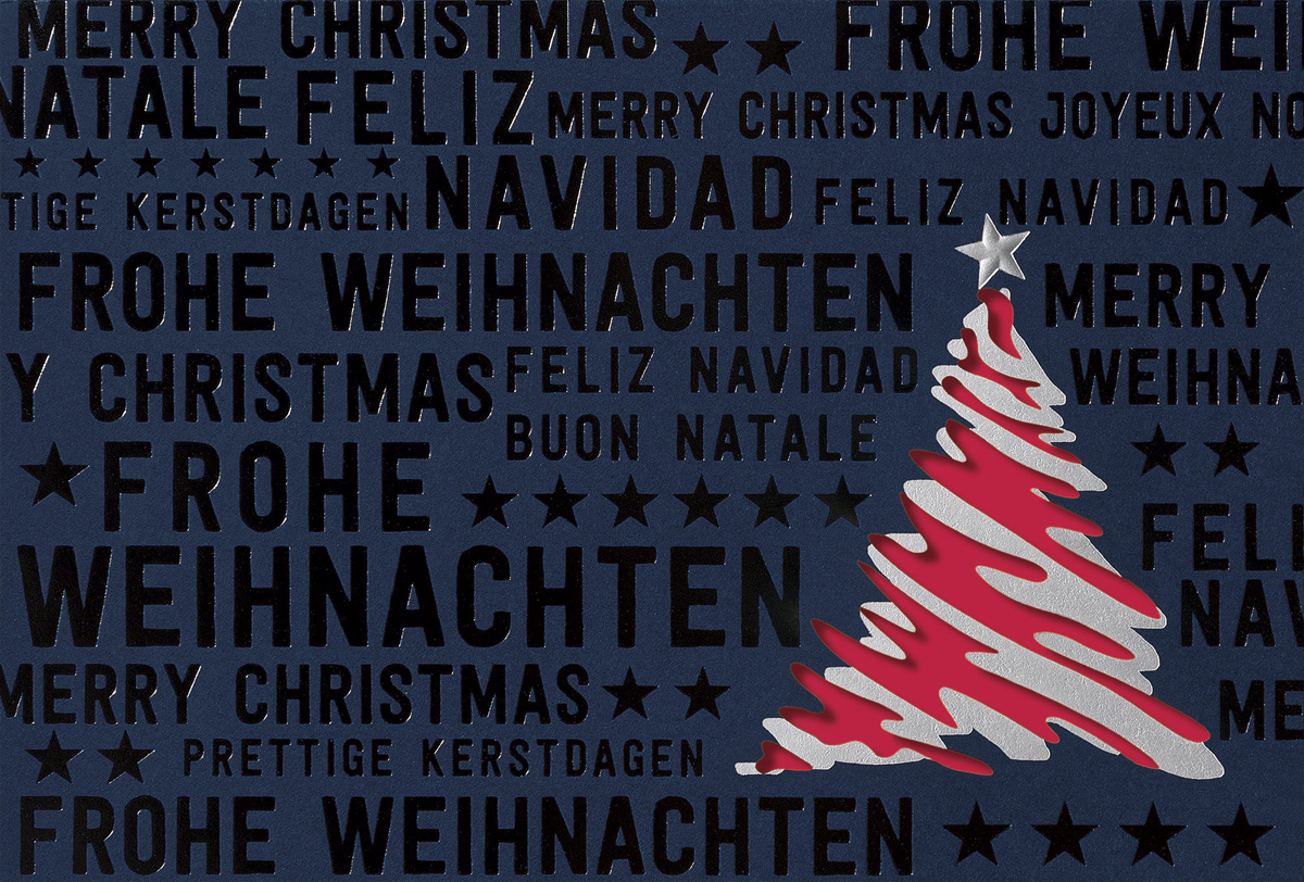 Internationale Weihnachtskarte in nachtblau mit rotem Einlegeblatt und Baumstanzung