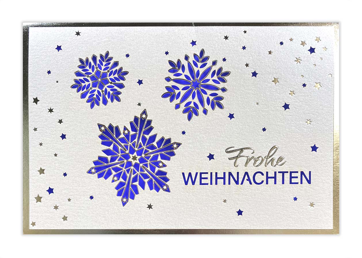 Exclusive Weihnachtskarte in weiß mit Laserstanzung blauem Falteinleger