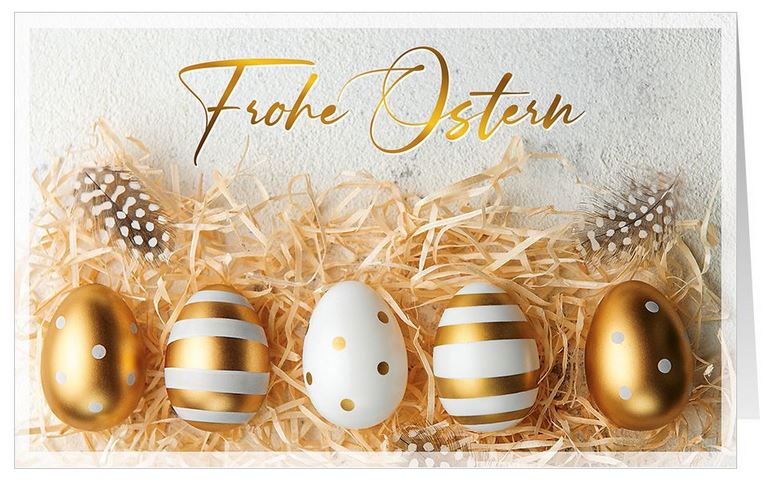 Glückwunschkarte zu Ostern mit Ostergruß und gold-weiß verzierten Eiern im Stroh