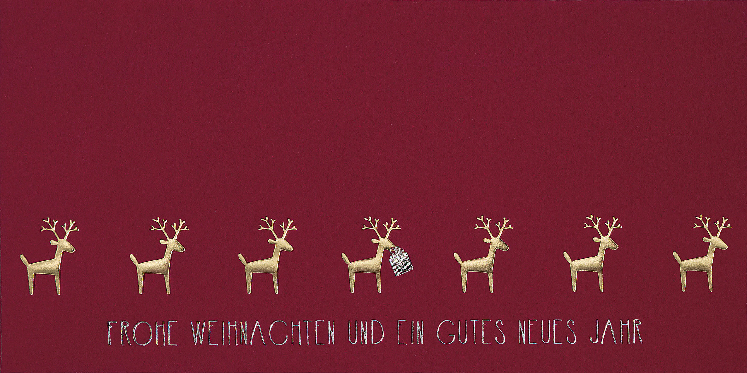 Rote Weihnachtskarte mit goldenen Hirschen und Weihnachtsgruß im DIN lang Format