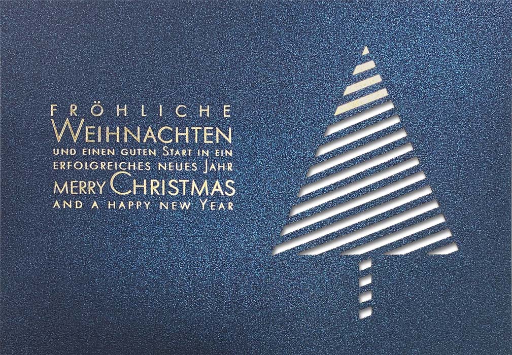 Blaue Weihnachtskarte mit Goldfolienprägung und Stanzung, mehrsprachig, Einleger weiß