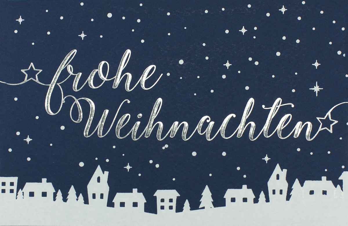 Weihnachtskarte in blau mit Sternenhimmel und Häusersilhouette sowie Silberfolienprägung