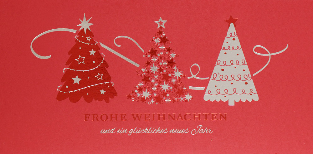 Rote Weihnachtskarte im DIN lang Format mit Tannenbäumen und Weihnachtsgruß in Prägung