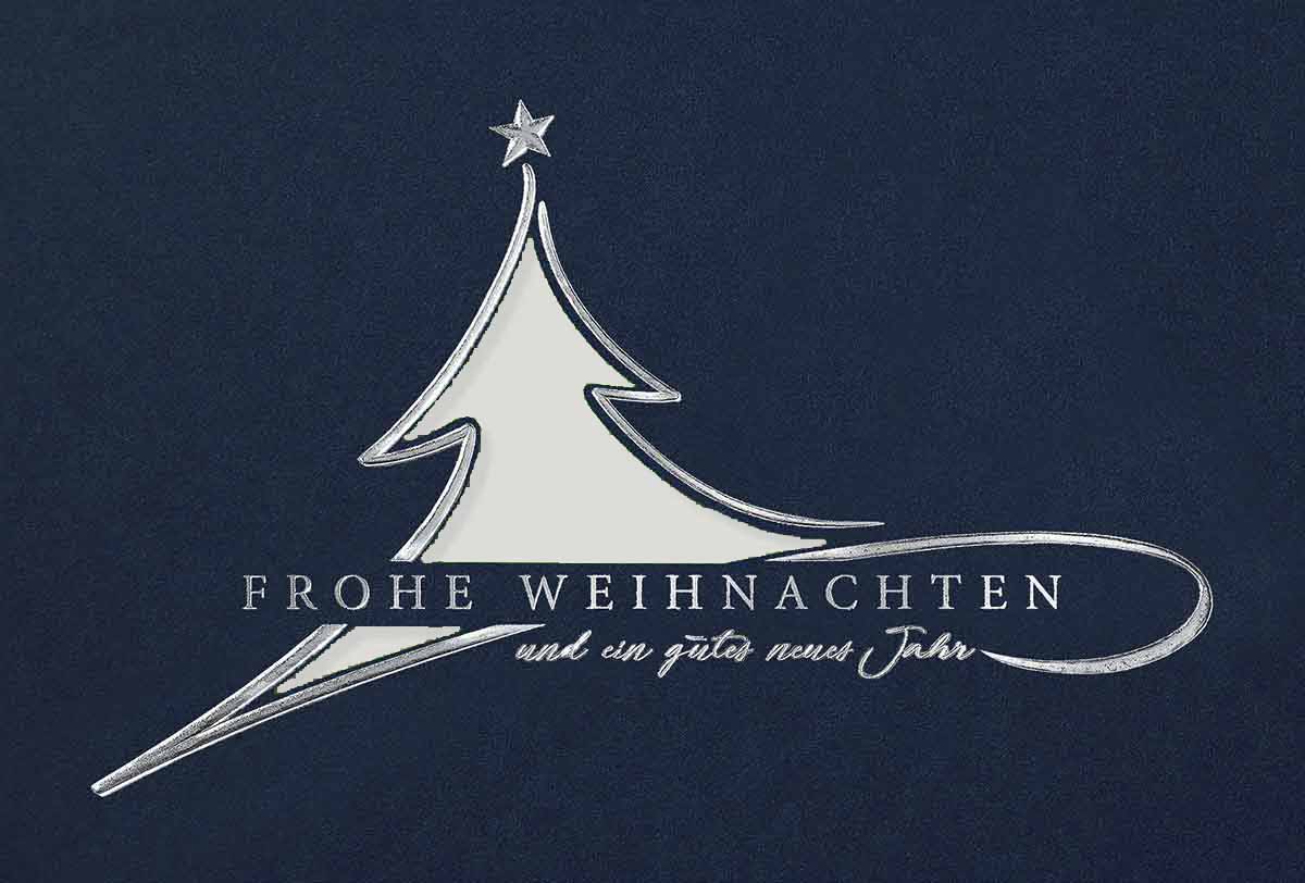 Stanz-Weihnachtskarte in blau mit weißem Einleger und edler Silberfolienprägung