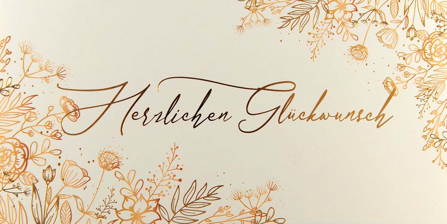 Klassische Glückwunschkarte in creme mit "Herzlichen Glückwunsch" und Blumen in edler Goldfolienprägung.