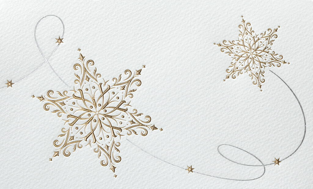 Cremeweiße Weihnachtskarte aus Aquarellkarton mit goldenen Sternornamenten