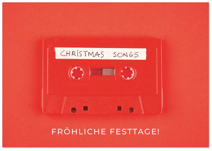 Originelle Weihnachtskarte mit Christmas Songs auf roter Musik-Kassette und Weihnachtsgruß