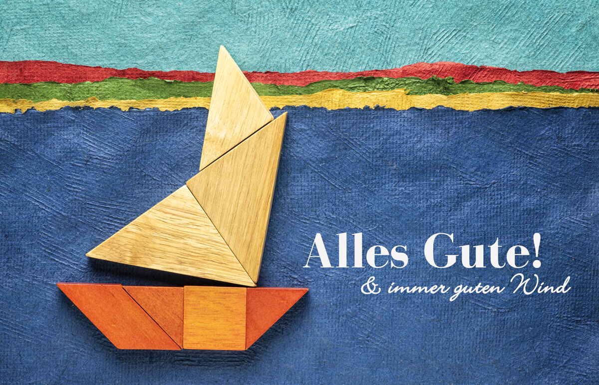 Farbenfrohe Glückwunschkarte mit Segelboot und "Alles Gute & immer guten Wind"