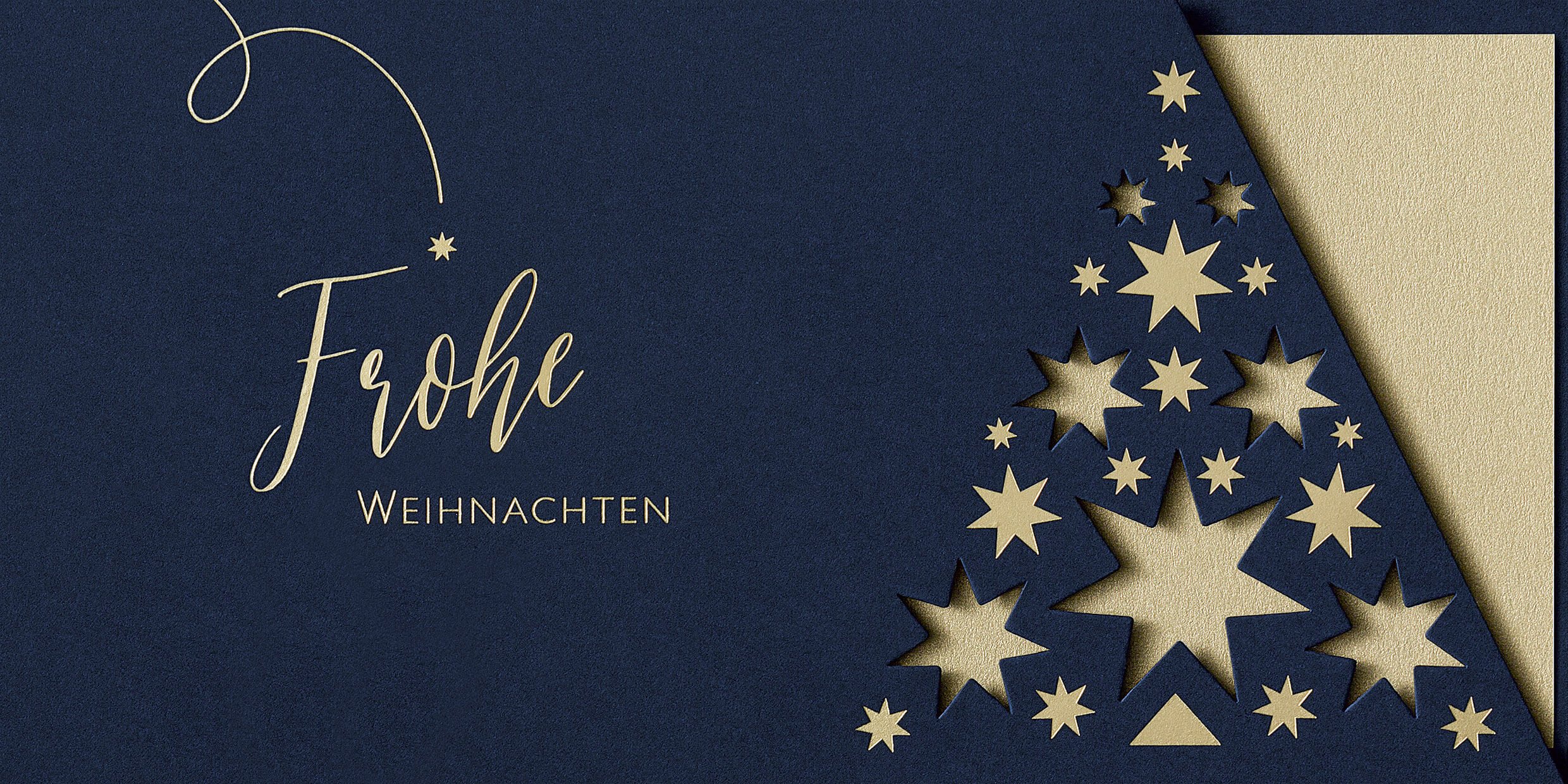 Dunkelblaue Weihnachtskarte mit Sternstanzung und goldenem Einlegeblatt im edlen Design